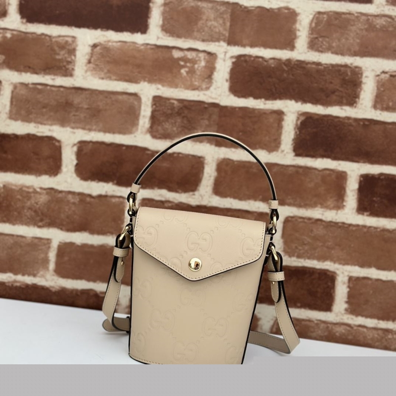 G*u*i top handle bags